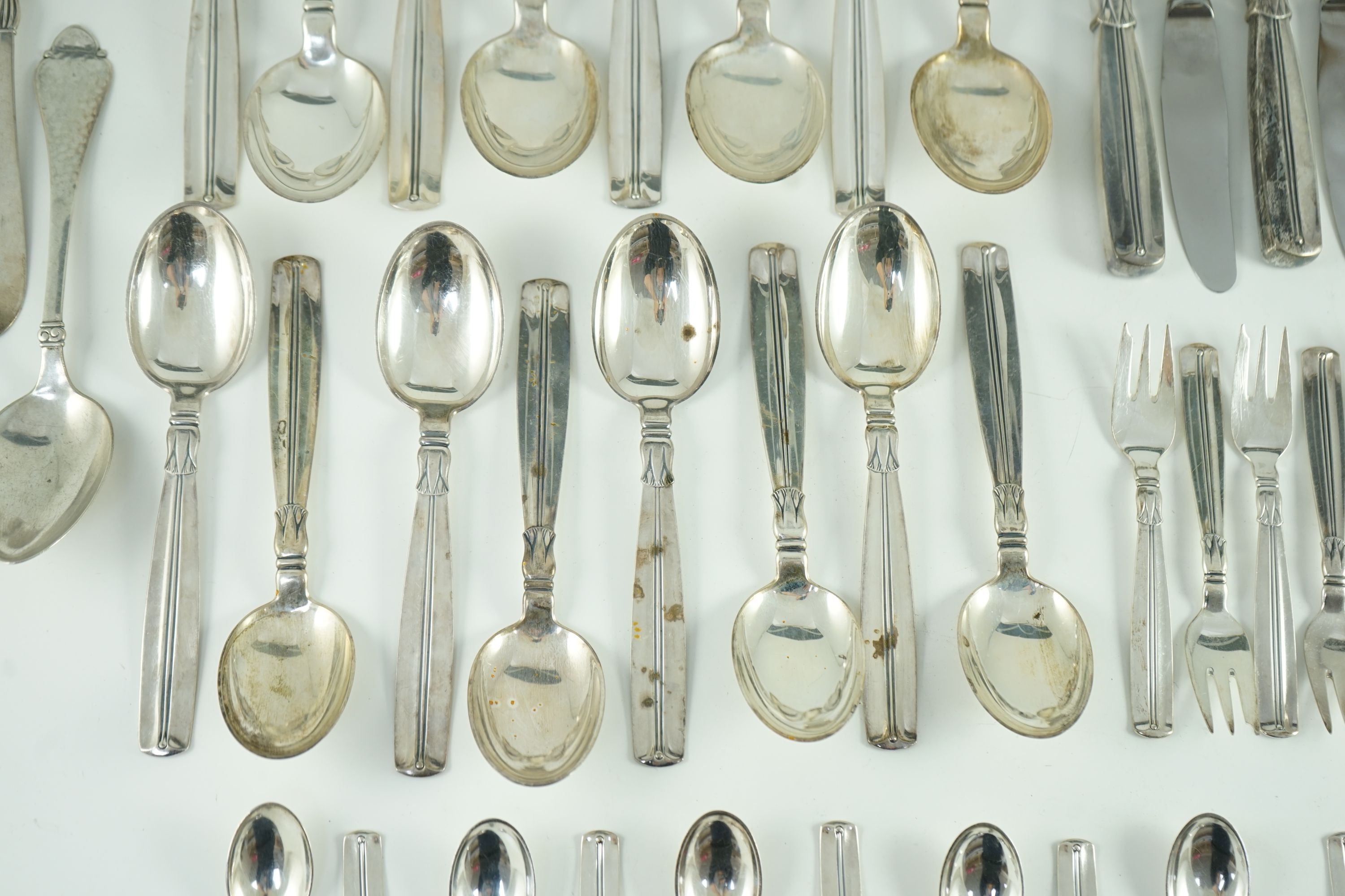 A mid 20th century harlequin part canteen of Danish 830 standard flatware by Broderne, W & S Sorensen